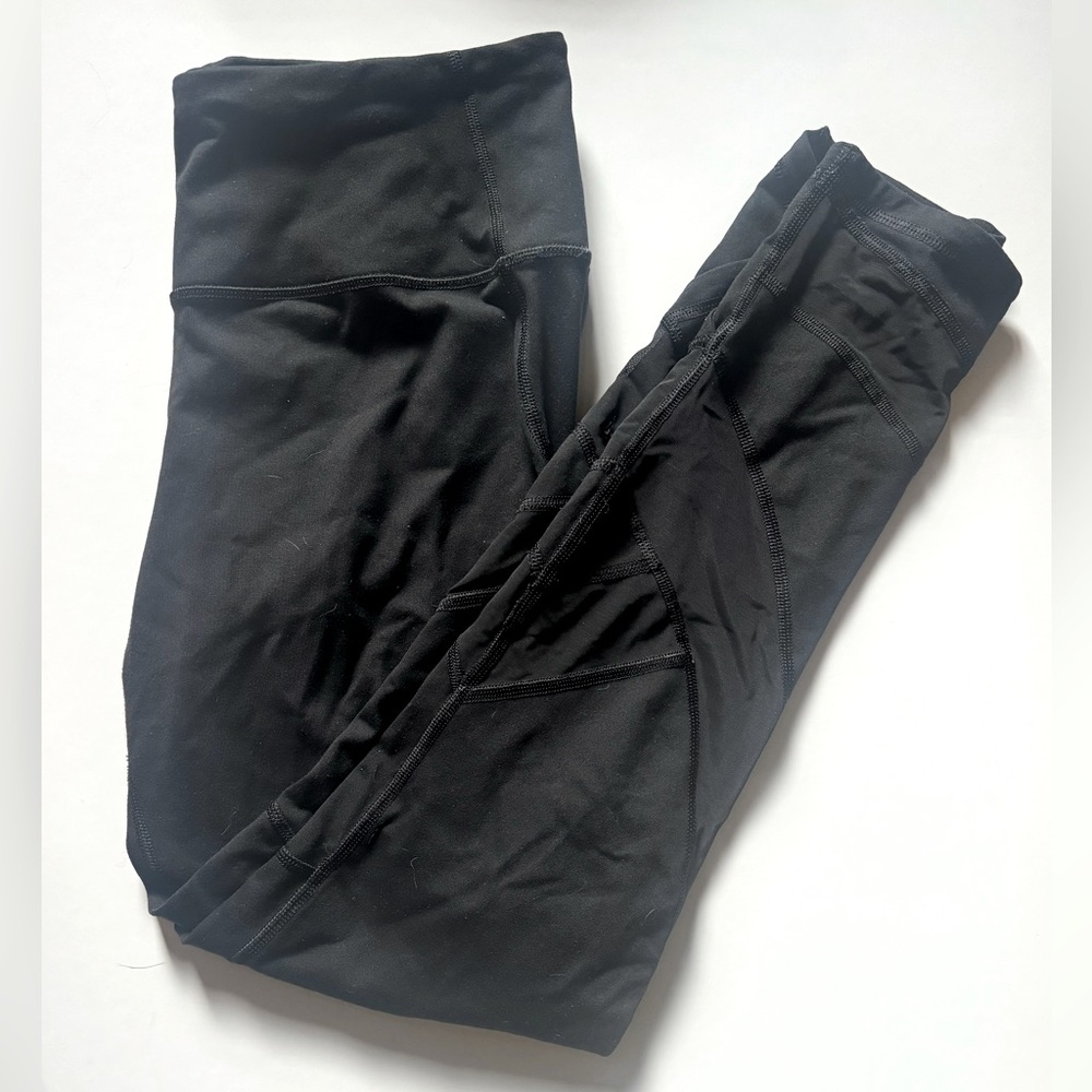 Black Victoria’s Secret leggings, size M